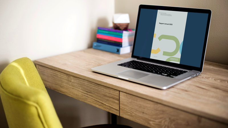 Ordinateur portable affichant le rapport annuel de la CDIP